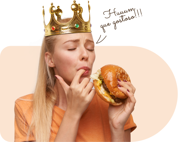 Menina comendo um hamburguer vegano